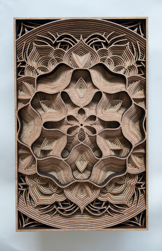 Illustration for article titled Artist Creates Stunning Wooden Sculptures With Laser Cutting Tech